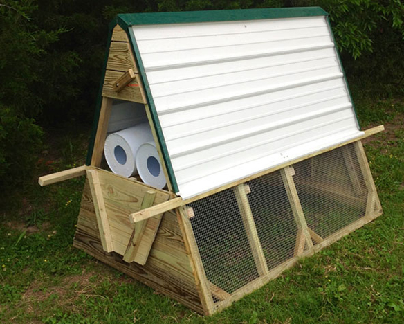 Large photo of a small homemade A frame chicken tractor.