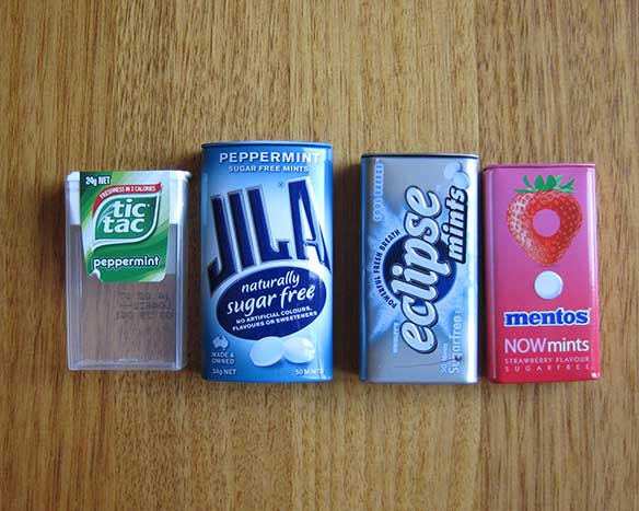 Large photo of Four different brands of mint boxes that are available in Australia.